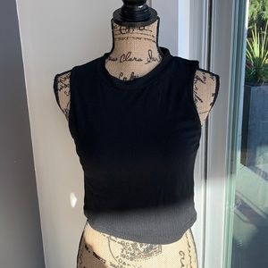 Black and white ripped tank tops sold together